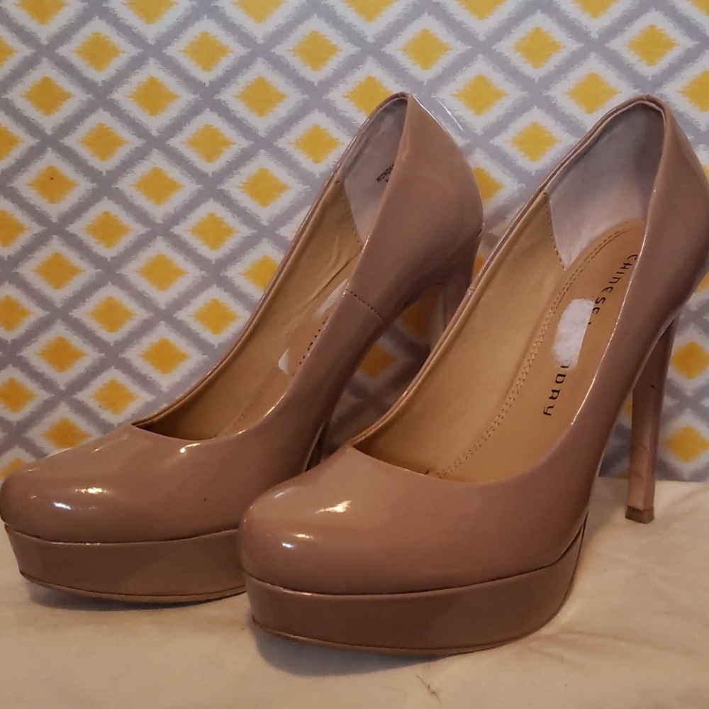 Nude patent platform heels